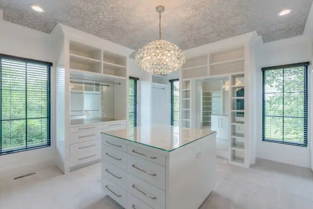 Walk-in custom closets designed by Anka Design Studio adding value to a DMV area home