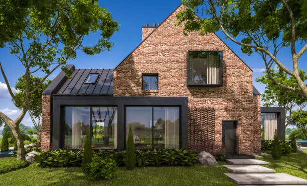Modern home addition with floor-to-ceiling glass walls seamlessly connected to a traditional brick house