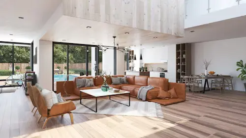 Light-filled two-story home addition with open-plan living area, wood accents, and large windows